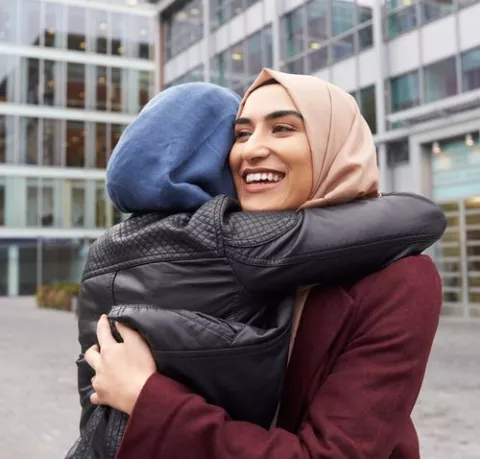 Women hugging